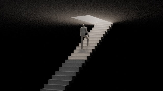 階段を人がのぼるイメージ
