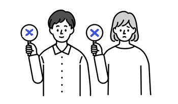✖のプラカードをもつ男女のイラスト